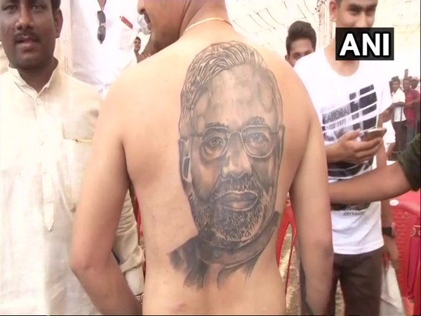 PM Modi's face tattooed