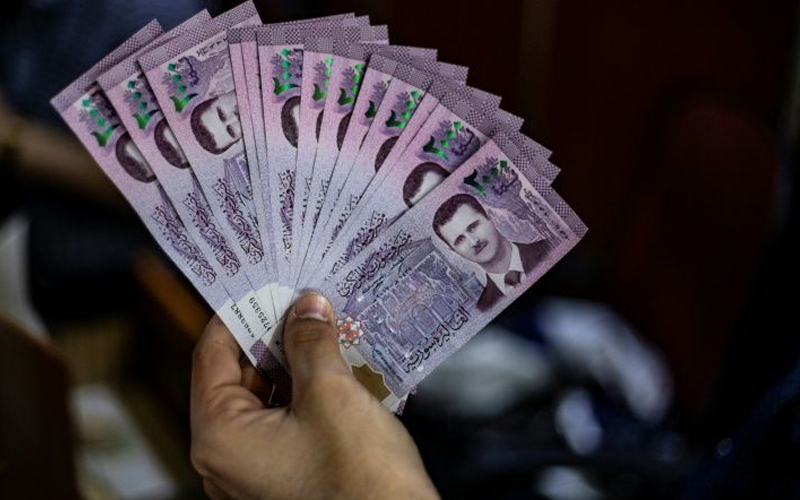 Plummeting Syrian pound hits new black market low