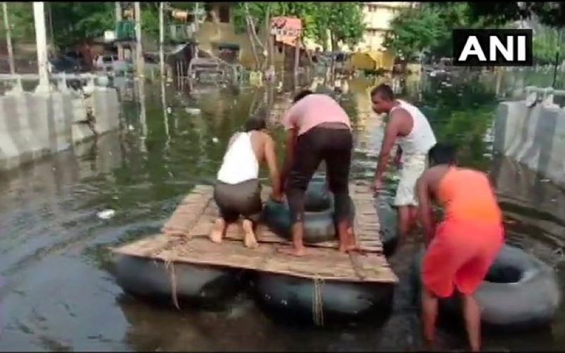 Bihar Floods: Locals construct makeshift boat to travel through streets