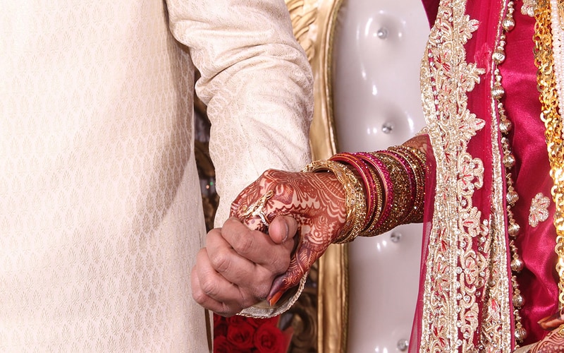 Interfaith couple who married secretly reunite