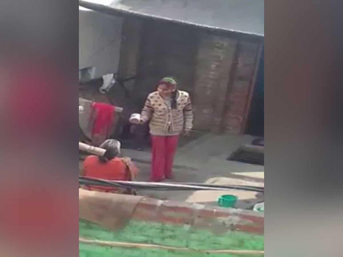woman beats mother in-law
