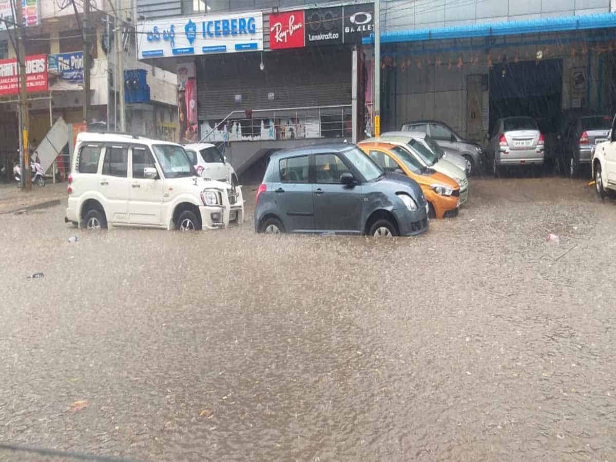 Hyderabad rain leaves puddles on roads