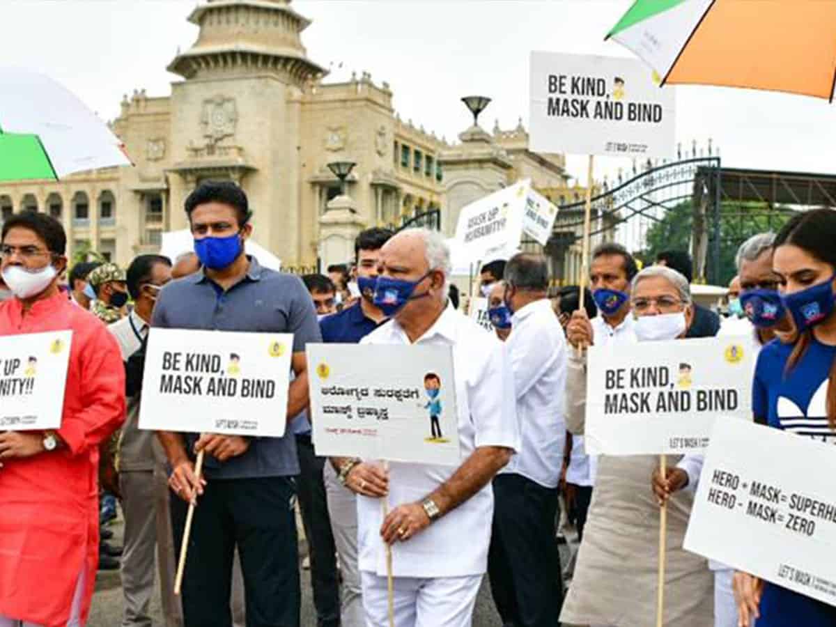 Chief Minister BS Yediyurappa along with other ministers and officials walked from Vidhana Soudha to Cubbon Park as part of the walkathon to create awareness about the importance of wearing a mask.