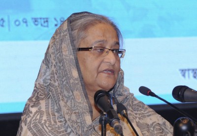 Hasina asks officials to extend help to flood-hit people