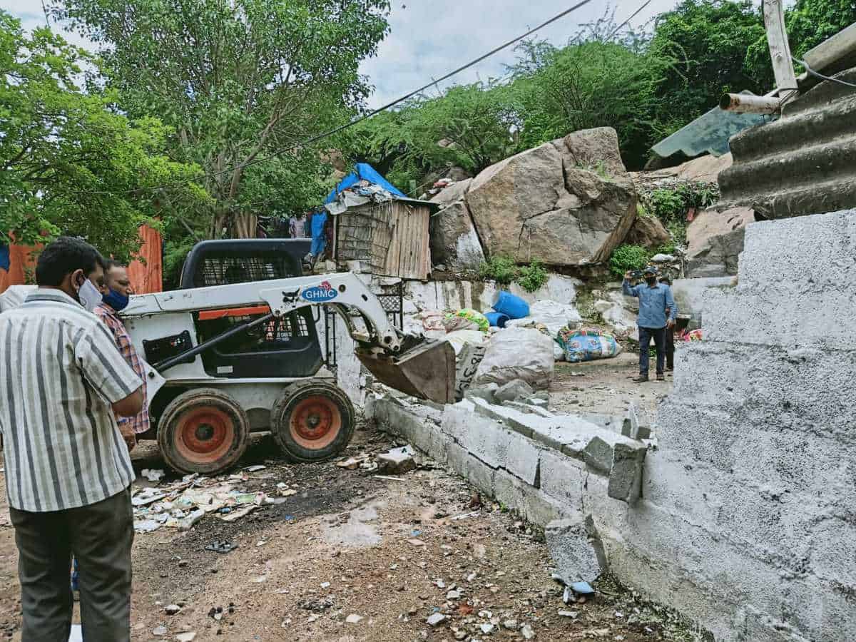 GHMC demolishes unauthorised buildings in Serilingampally GHMC demolishes unauthorised buildings in Serilingampally