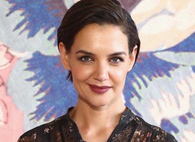 Katie Holmes' new beau 'can't get enough' of her
