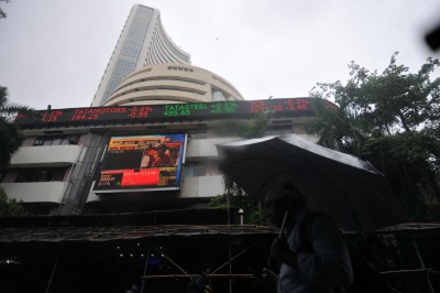 Sensex gains over 300 points, RIL at record high