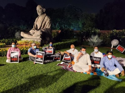 Singing, sitting on grass: 8 suspended MPs continue dharna