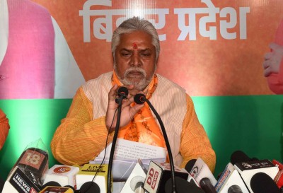 Bihar Minister Prem Kumar in trouble for wearing lotus mask