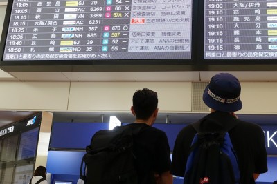 Japan eases travel curbs for foreigners who aren't tourists