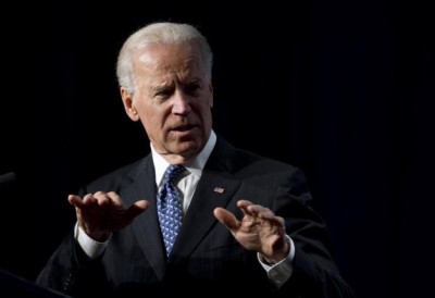 Biden says US "facing a dark winter," urges mask-wearing