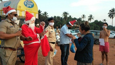 Cops dressed as Santa create Covid awareness in Goa village