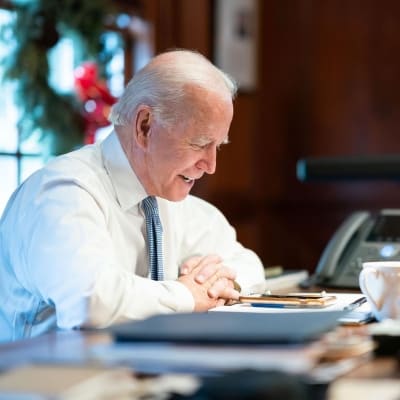 Biden signs executive orders to expand food stamps, up federal pay