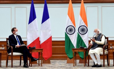 China's muscle flexing brings France and India together