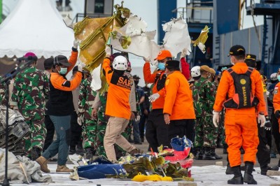 Indonesian officials identify body of crashed plane's pilot