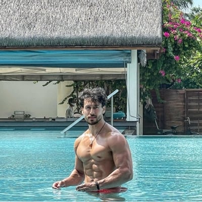Tiger Shroff flaunts his perfect washboard abs in pool picture