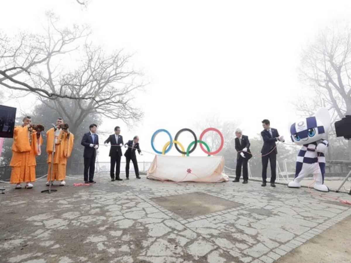 100 days for Tokyo: Olympic Rings unveiled on Mount Takao