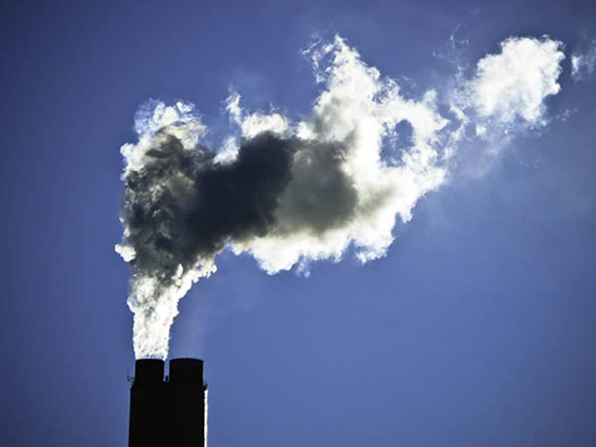 China, moving cautiously, starts carbon trading market