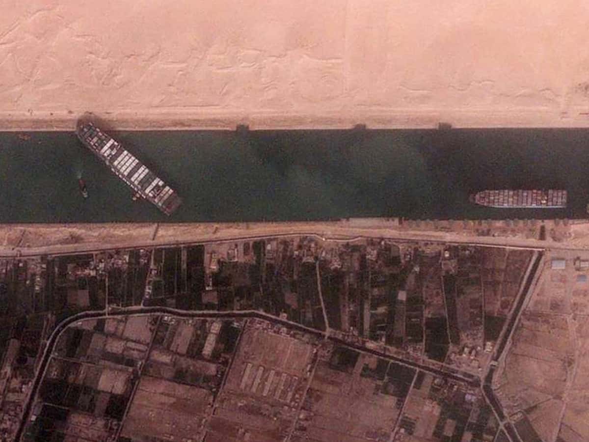 Vessel runs aground, briefly blocking part of Suez Canal