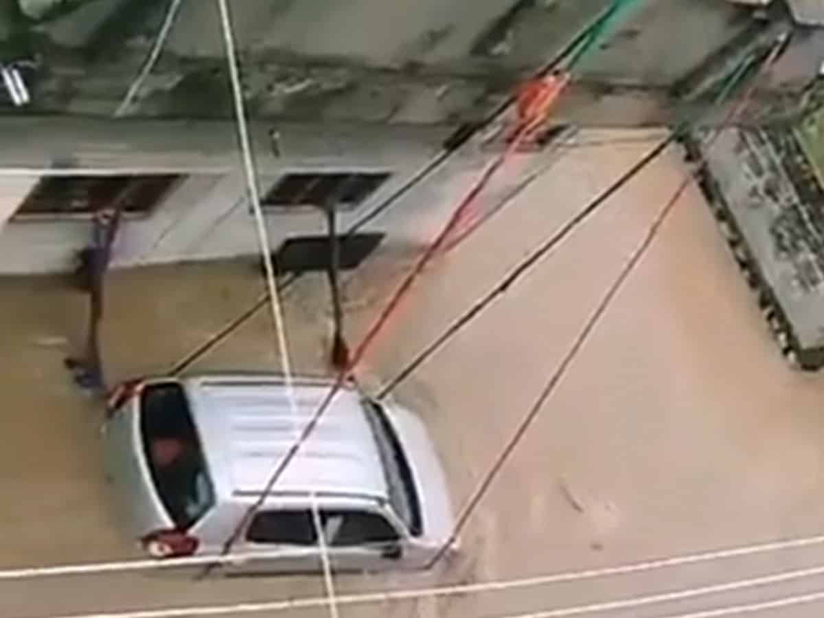 Man ties car with ropes in flood-hit Telangana town
