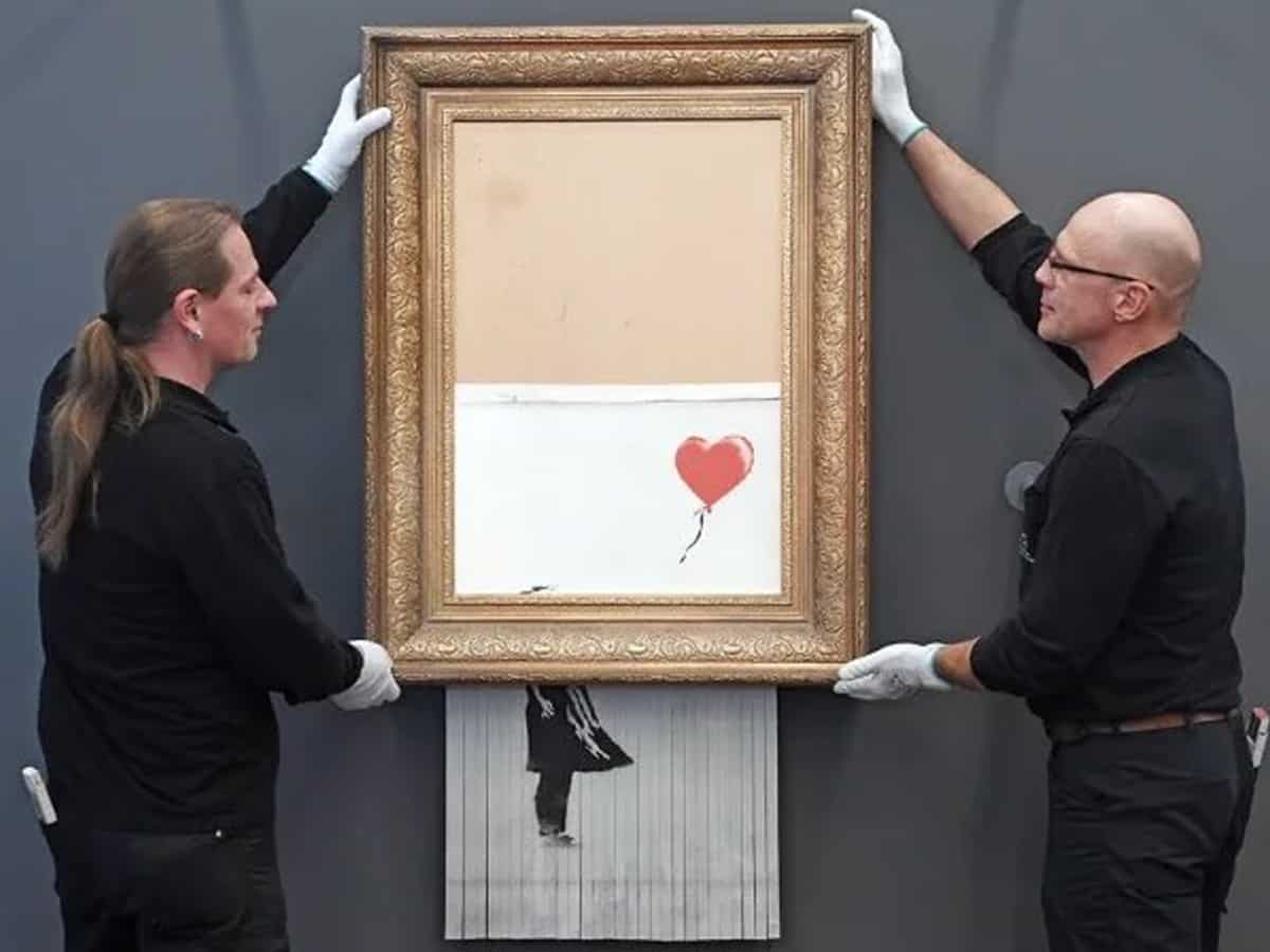 Shredded Banksy artwork sells for USD 25.4 million at auction