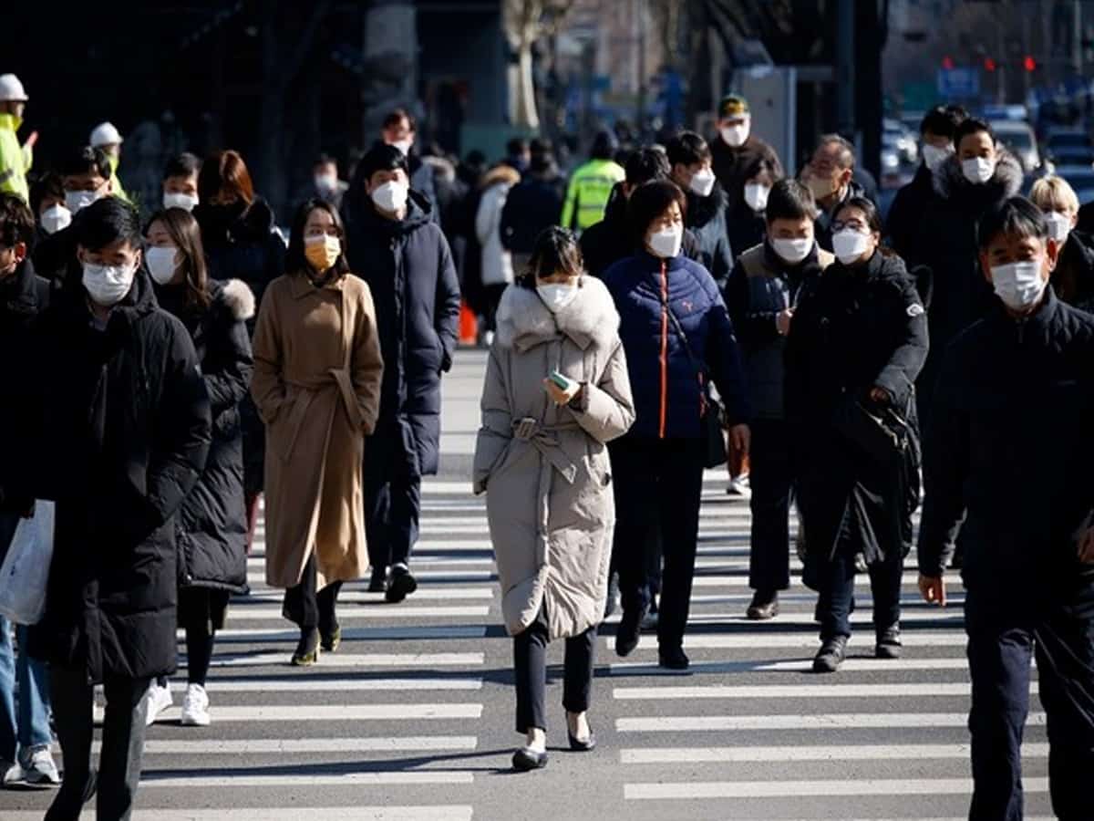South Korea sees record virus jump as thousands take college exam